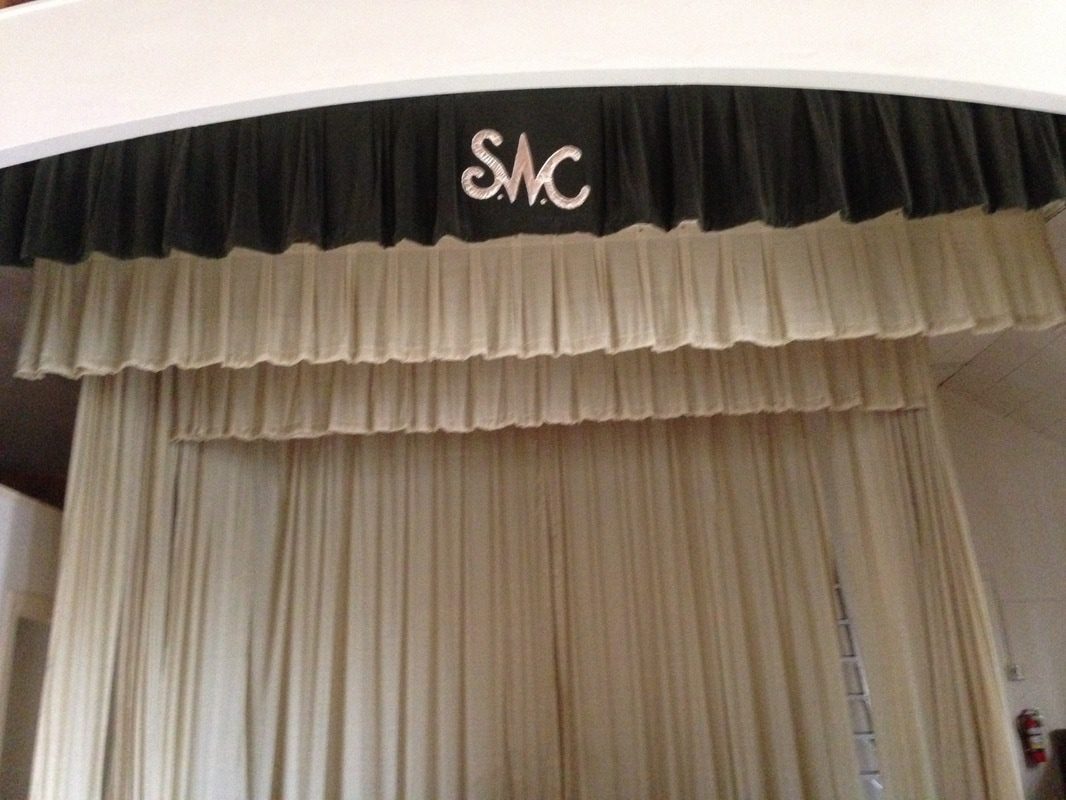 Elegant theater curtains with logo