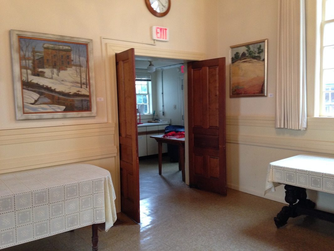 Room with open wooden doors