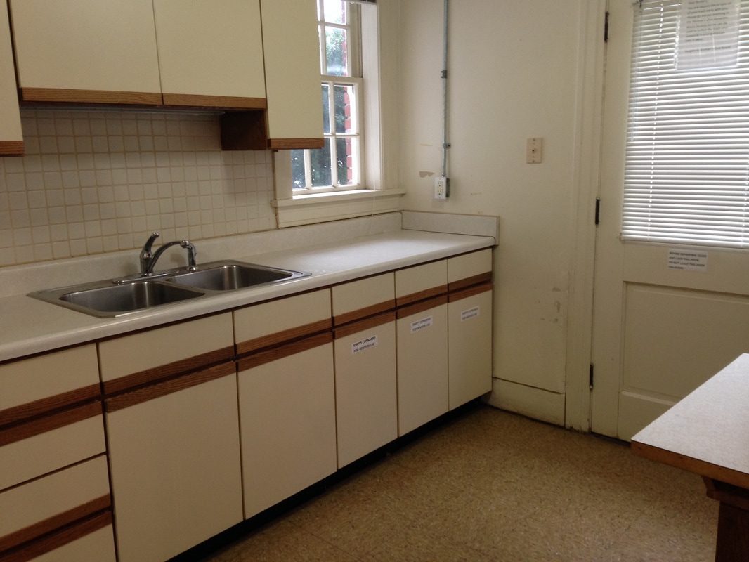 Simple kitchen with white cabinets