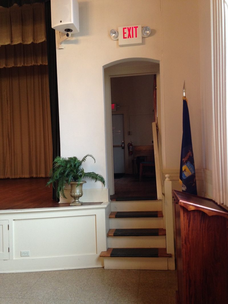 Stage exit with stairs and flag