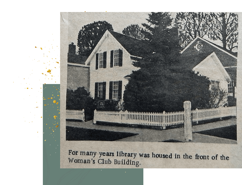 Historic Woman's Club house with white picket fence
