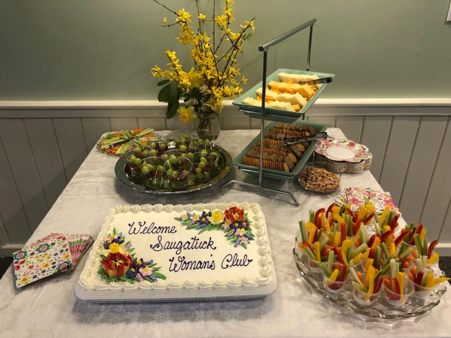 Welcome cake and assorted appetizer buffet