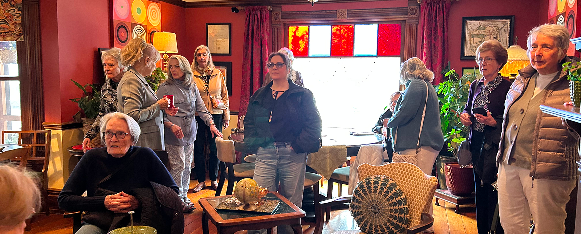 Group of women socializing in cozy living room