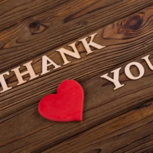 Wooden thank you letters with red heart